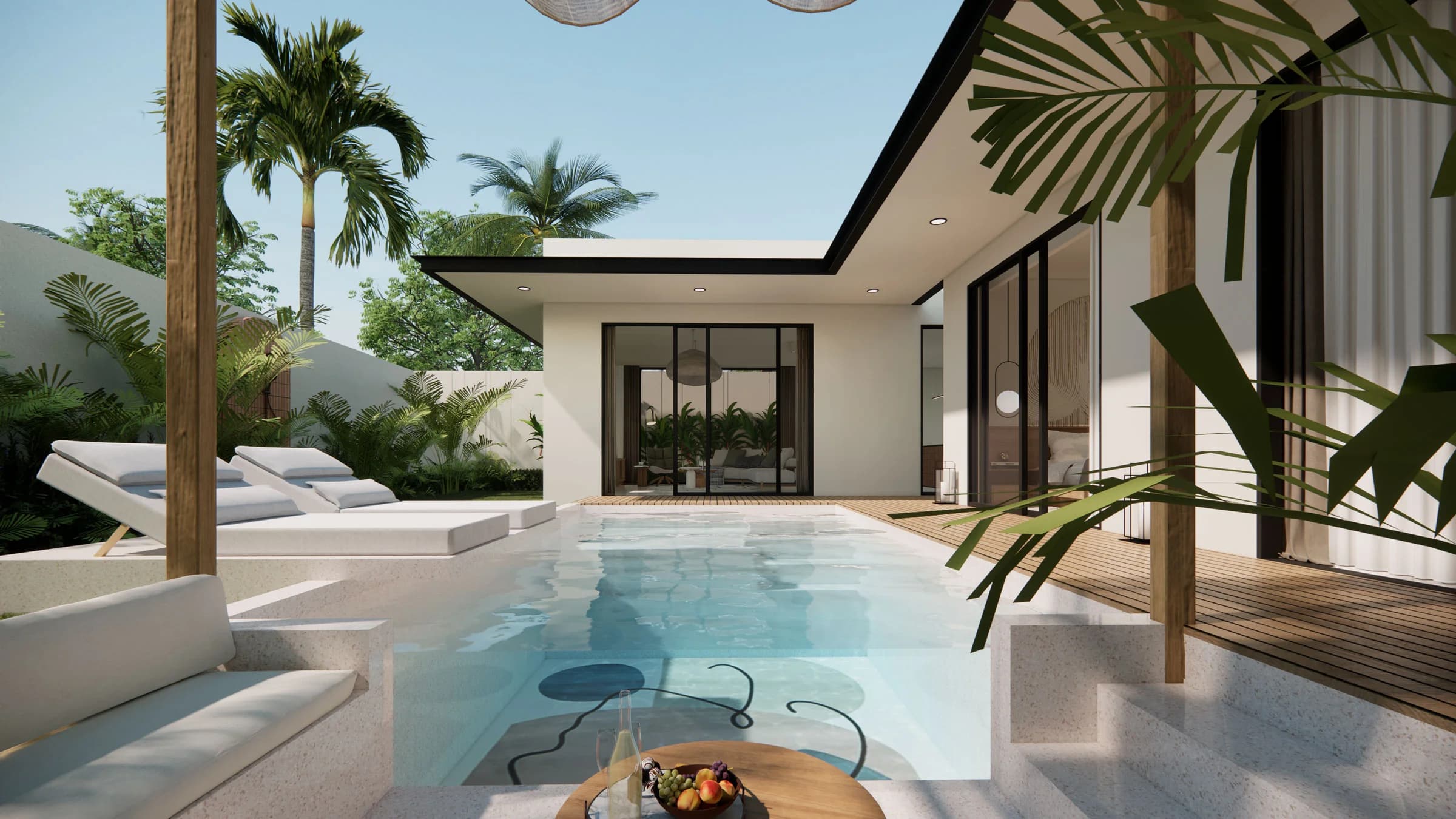 Exterior with lush vegetation and swimming pool of a villa for sale in central kuta