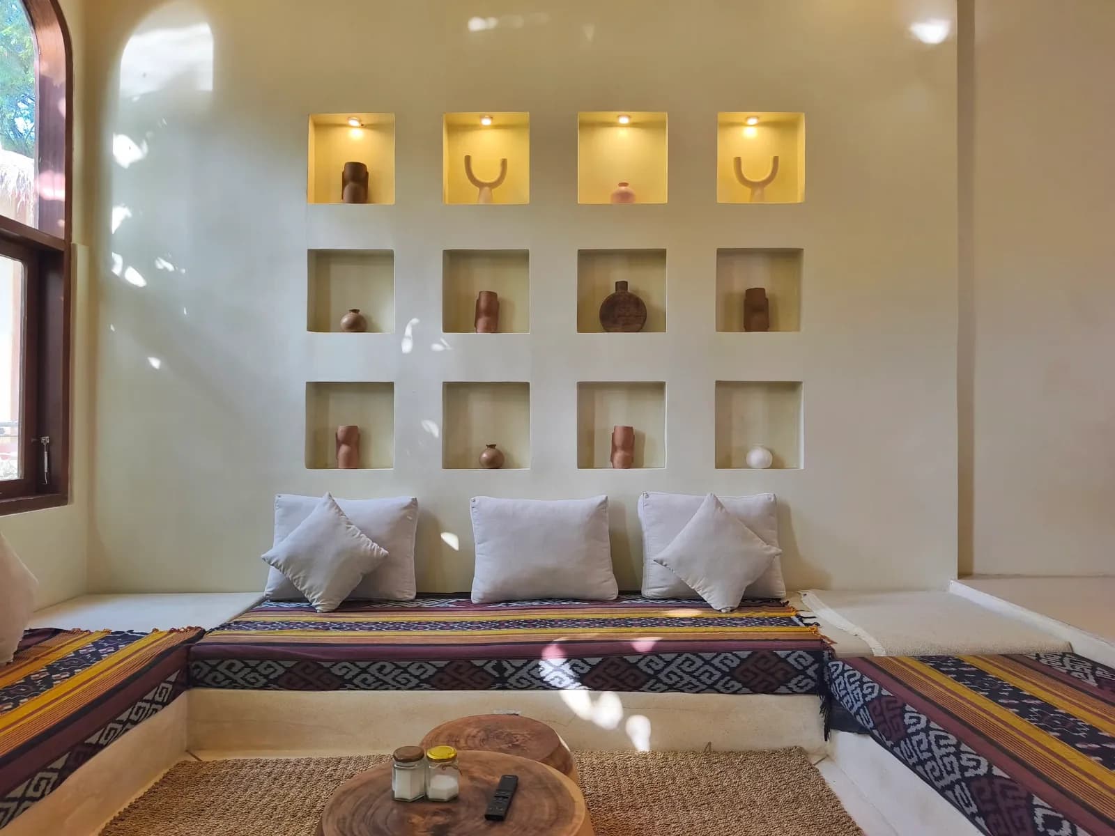 Sunken couch in the living room of the built villa for sale in Kuta, South Lombok