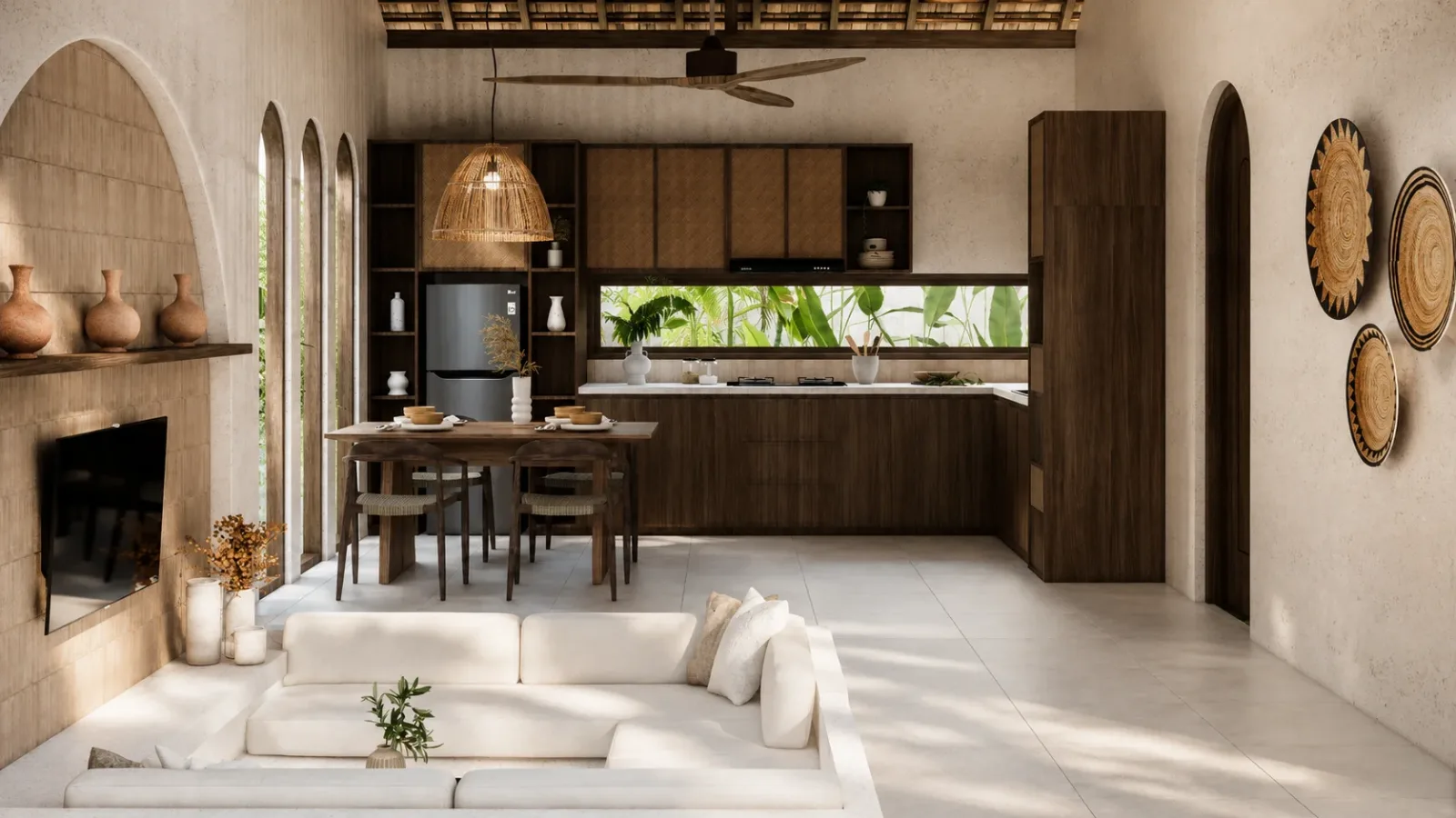 Kitchen opening onto the living area in a Kuta tropical villa for sale, South Lombok
